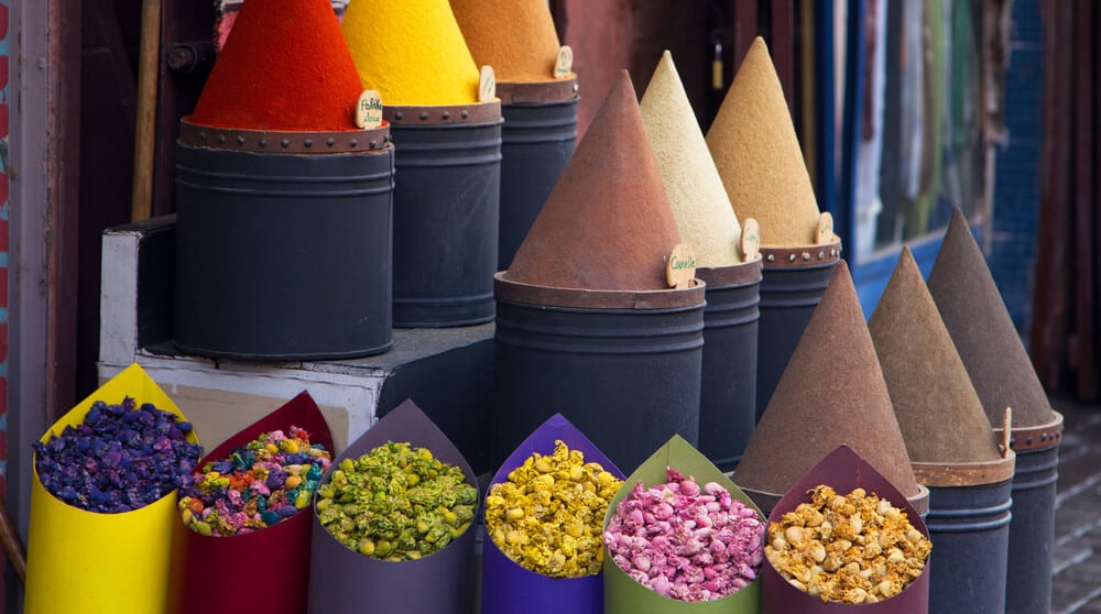 Article: St. Clair Scents Review of Casablanca. Image shows spices and flowers in a shop in Morocco